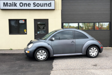 2003 Volkswagen Beetle with professional window tint in North Bay